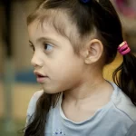 Learning Paths Academy Junior Kindergarten - cute, young girl with curious look on her face