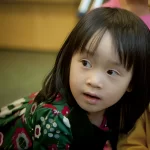 Learning Paths Academy Preschool Explorers - cute, young, Asian girl with curious look on her face