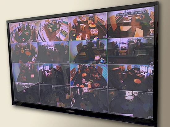 Security Cameras display in lobby, showing 16 rooms at Learning Paths Academy