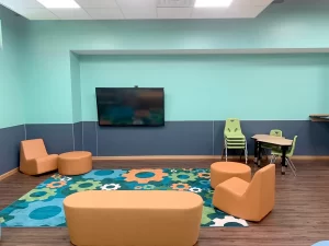 Learning Paths Academy South Campus Youth Zone School Age Room Sitting area TV