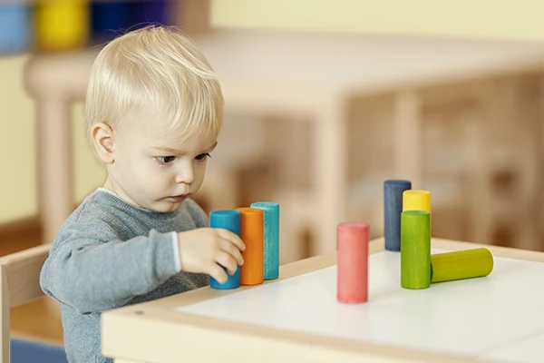 toddler daycare preschool - one year old learning with blocks at Learning Paths Academy
