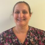 April Raimond, Assistant Director